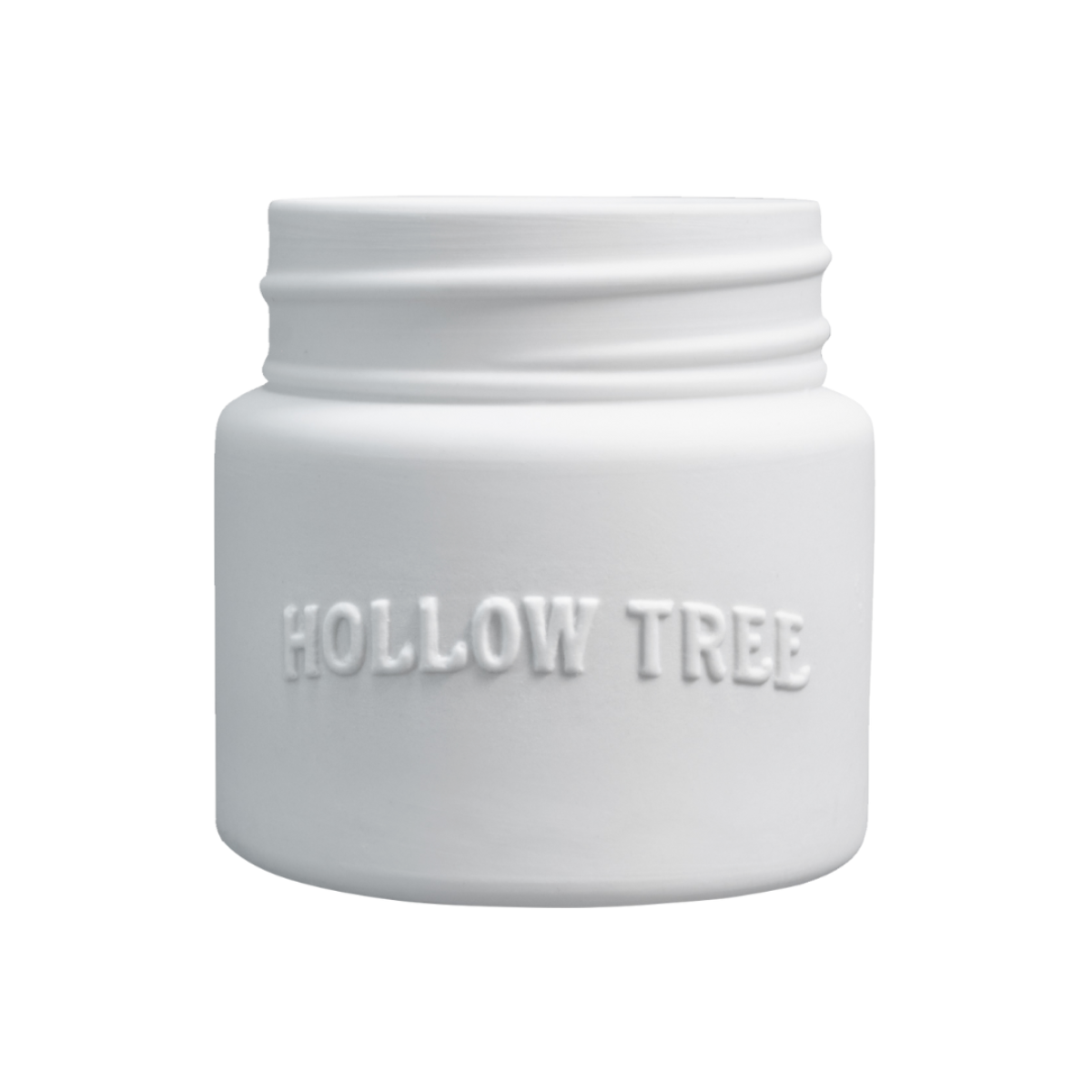 A white ceramic candle jar with the brand name 'HOLLOW TREE' embossed on the front.