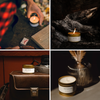 Gold-lidded travel candle tin held in hand with flame
