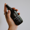 Black scent spray bottle with fine mist nozzle and spray cap