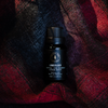 Diffuser oil bottle with ridged cap and 15ml label, set on plaid fabric
