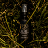 Room spray bottle with Sea to Sky label, clear spray top, dark glass